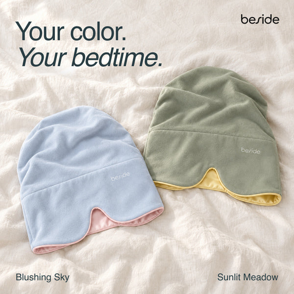 Blushing Sky and Sunlit Meadow Sleep Hoods shown together in light blue and sage green with contrasting linings.