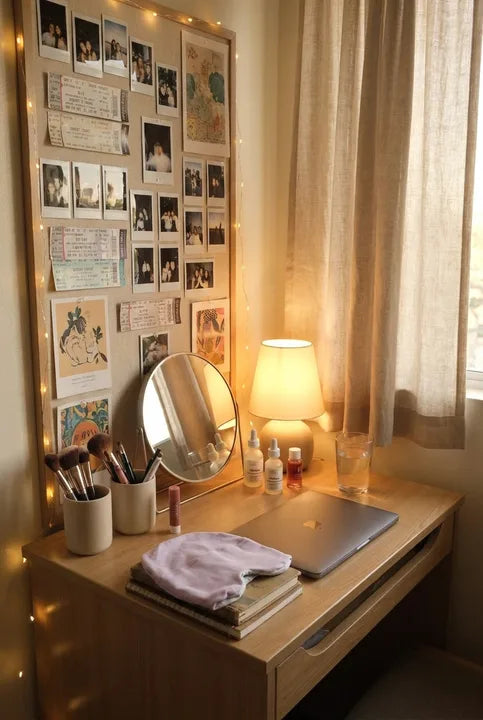 Lavender Sleep Hood resting on a cozy vanity with polaroid photos and warm lamplight